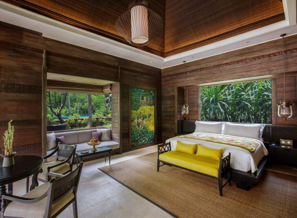 open tropical resort room with two large windows